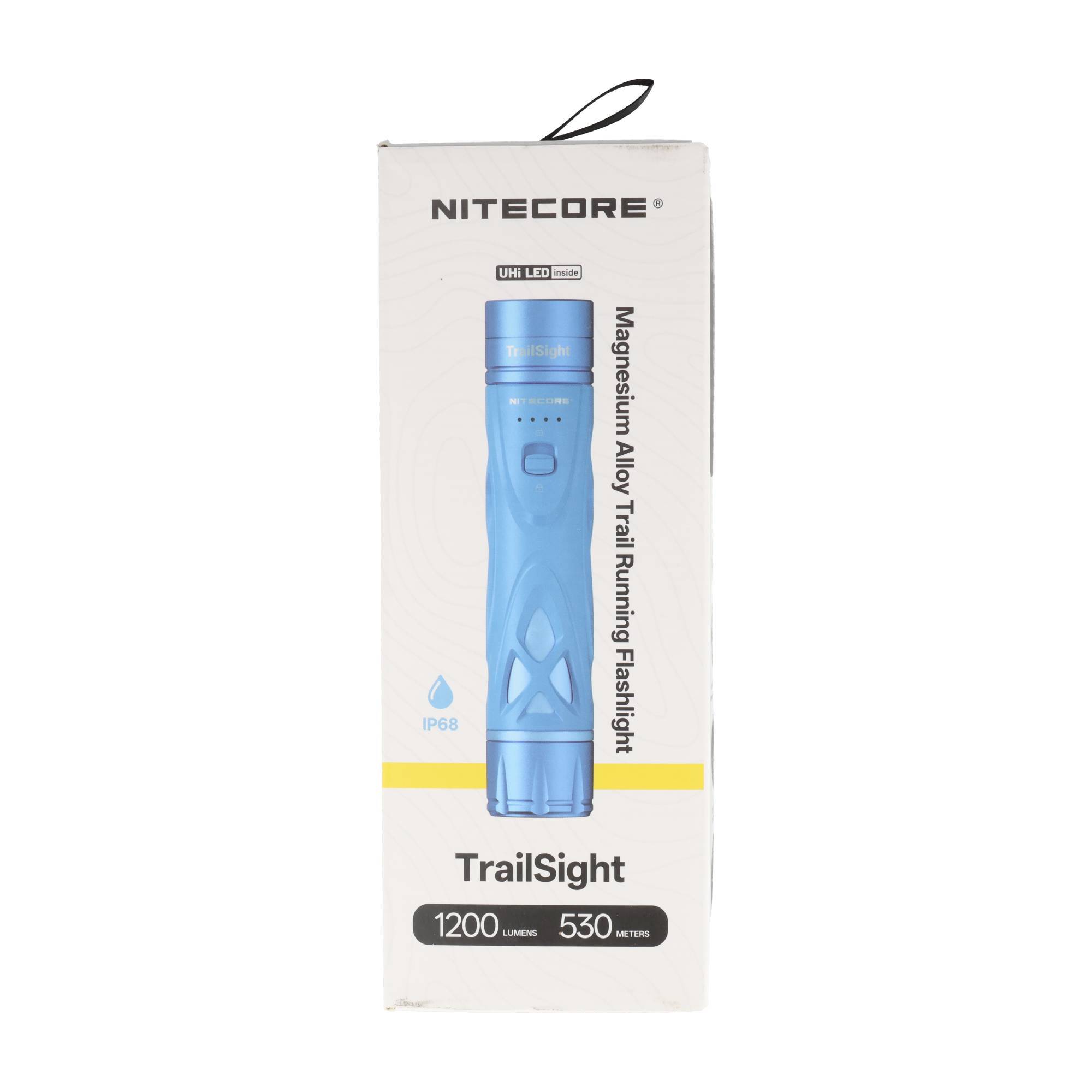 Verpackung für eine NITECORE TrailSight Magnesiumlegierung Laufleuchte, die eine blaue Taschenlampe, 1200 Lumen und 530 Meter Reichweite zeigt.