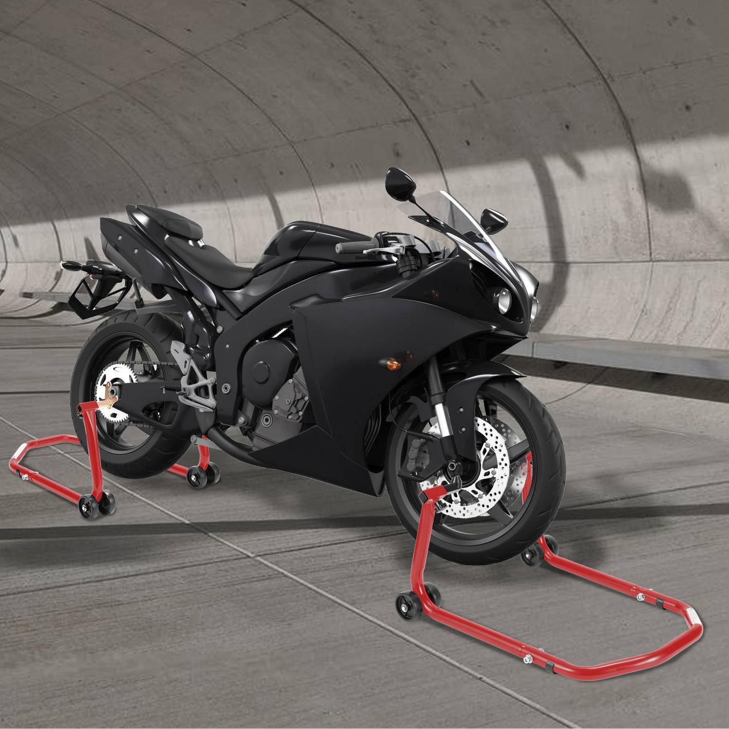 Schwarzes Sportmotorrad auf roten Vorder- und Hinterständern in einem Betonuntergrund gesichert.