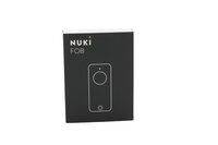 Schwarze Nuki FOB Smart-Lock-Fernbedienung auf weißem Hintergrund dargestellt.