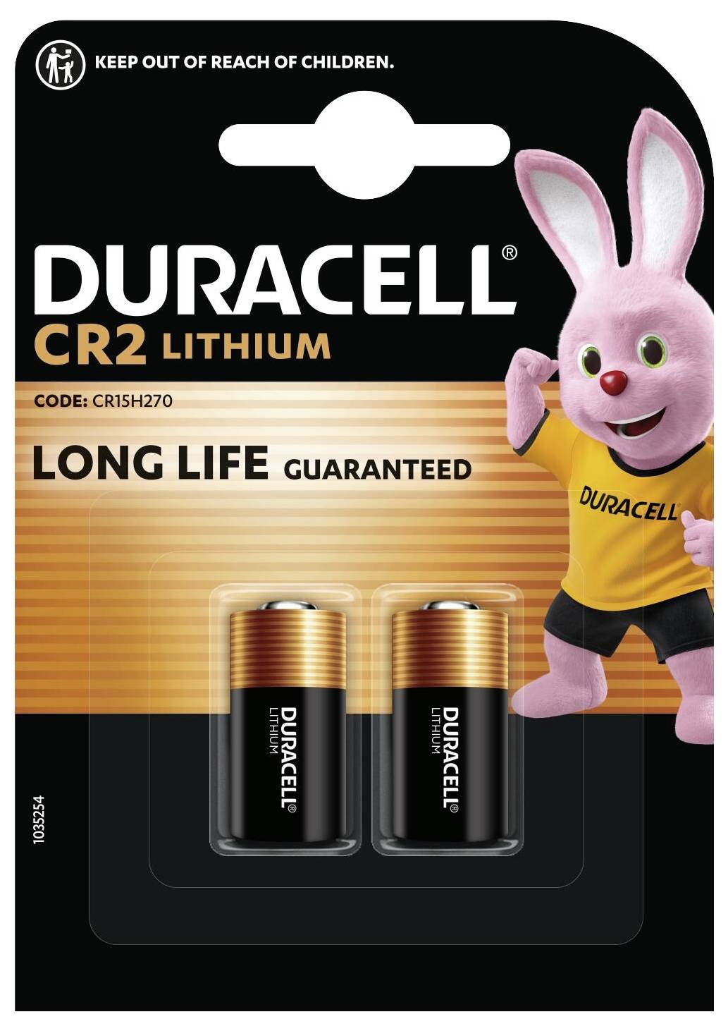 Package with two Duracell CR2 lithium batteries, featuring a pink mascot holding a battery. Text: 'Long life guaranteed'.