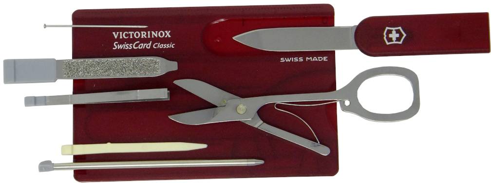 A red Victorinox SwissCard Classic with scissors, nail file, blade, tweezers and ballpoint pen, all neatly integrated.