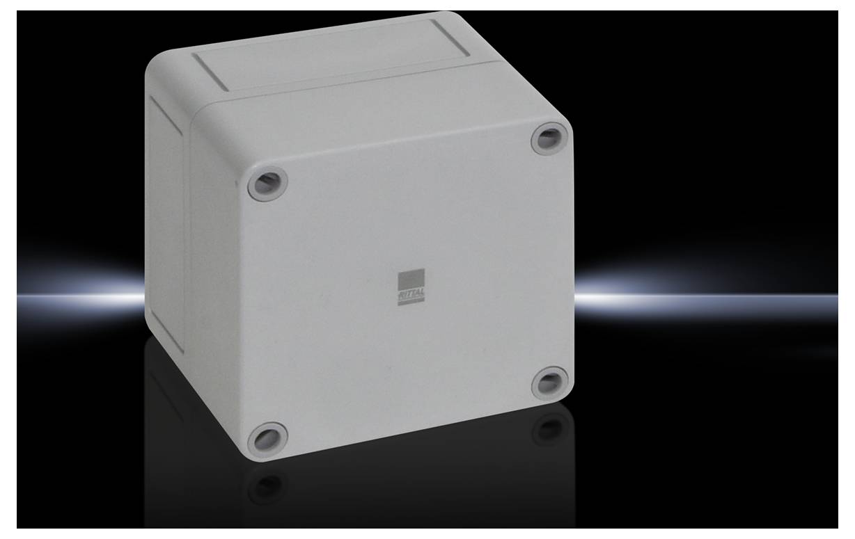 A grey, square plastic box with slightly rounded corners and four screws at the corners on a black background.