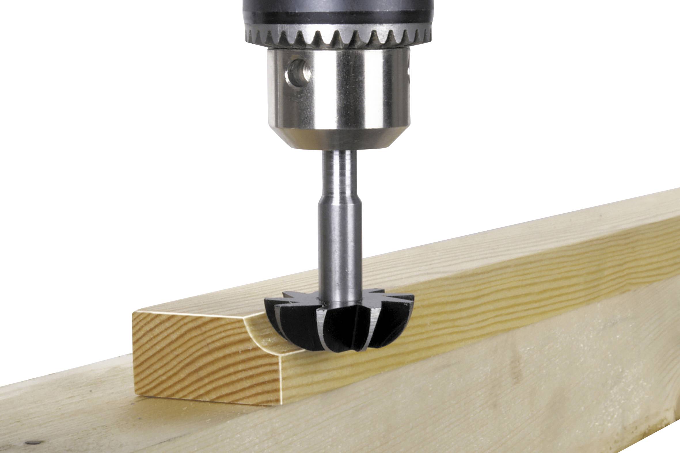 A Forstner bit is drilling a hole into a wooden beam. The bit creates clean, flat holes and is precisely positioned.