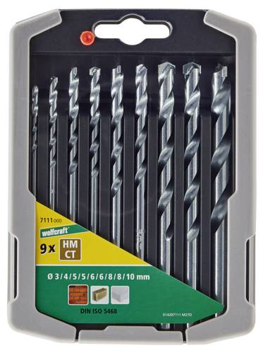 Drill set with nine differently sized stone drill bits, suitable for concrete, masonry, and tiles; packed in a grey plastic box.