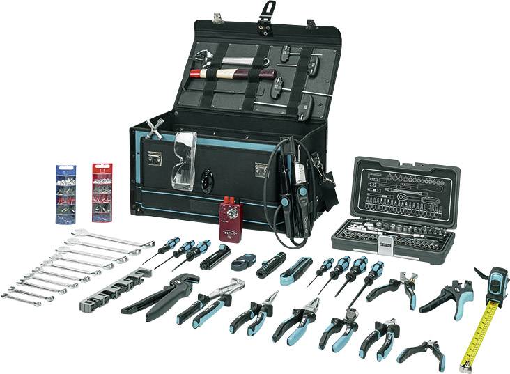 A wide selection of tools is arranged in front of an open toolbox, including spanners, pliers, screwdrivers and a tape measure.
