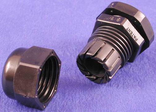 Two black cable glands on a blue background, one fully and one partially disassembled.
