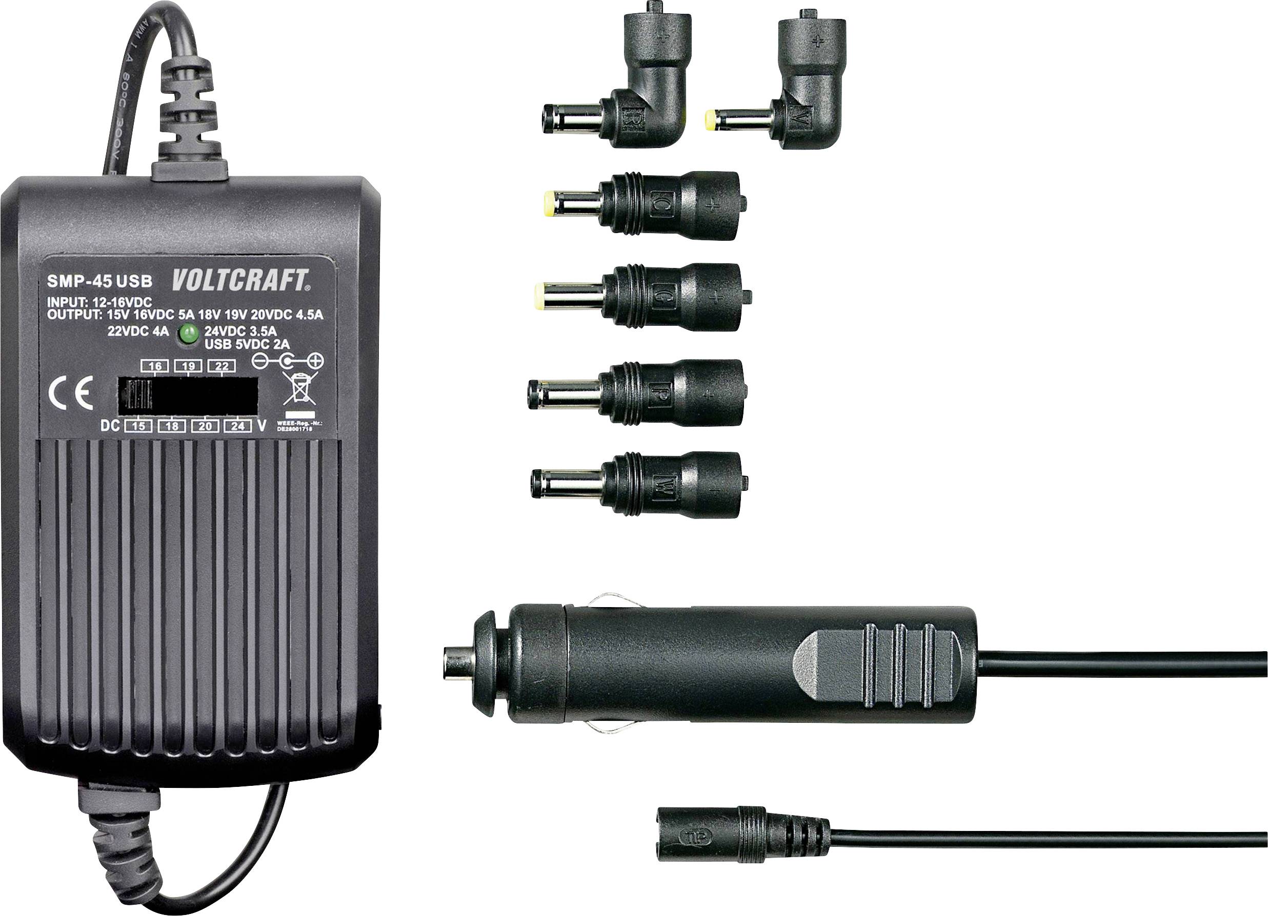 Power supply with five interchangeable plugs and car adapter, suitable for 100-240V inputs and 15V/3000mA output. Brand marking: 'Voltcraft'.