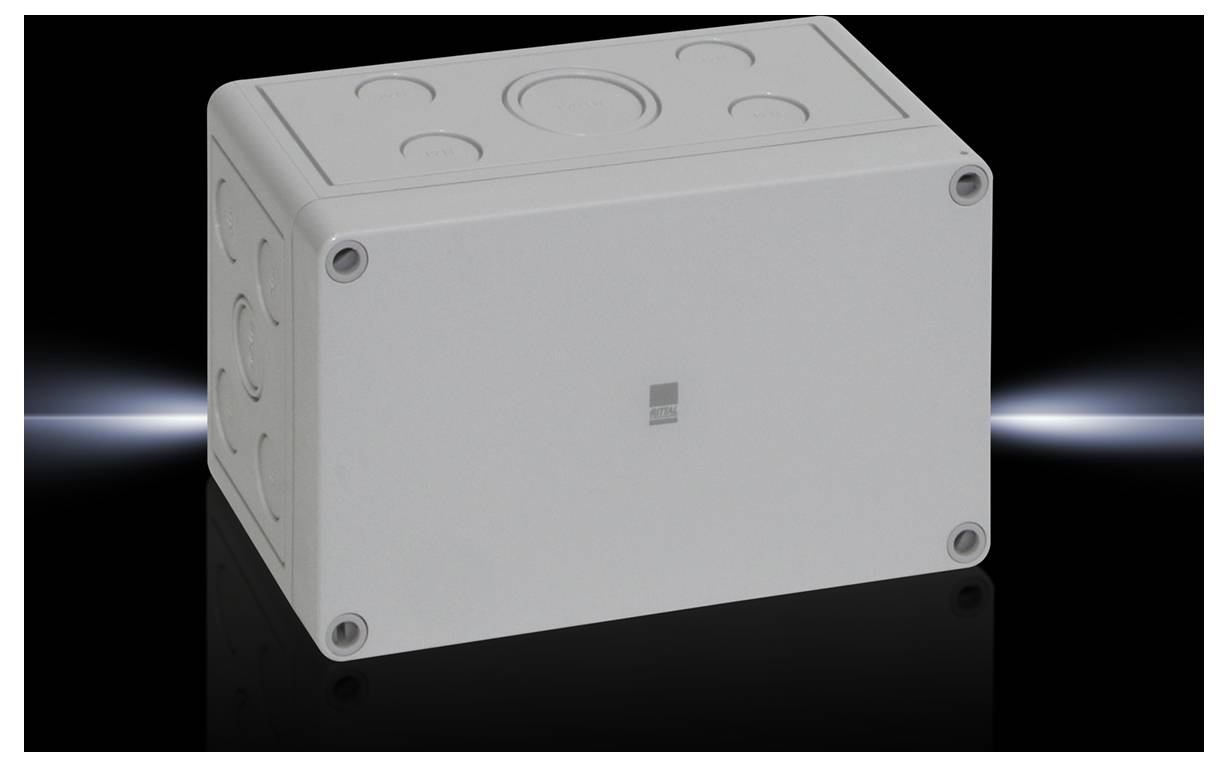 Grey rectangular casing with rounded corners and pre-moulded openings, set against a black background with light reflections.