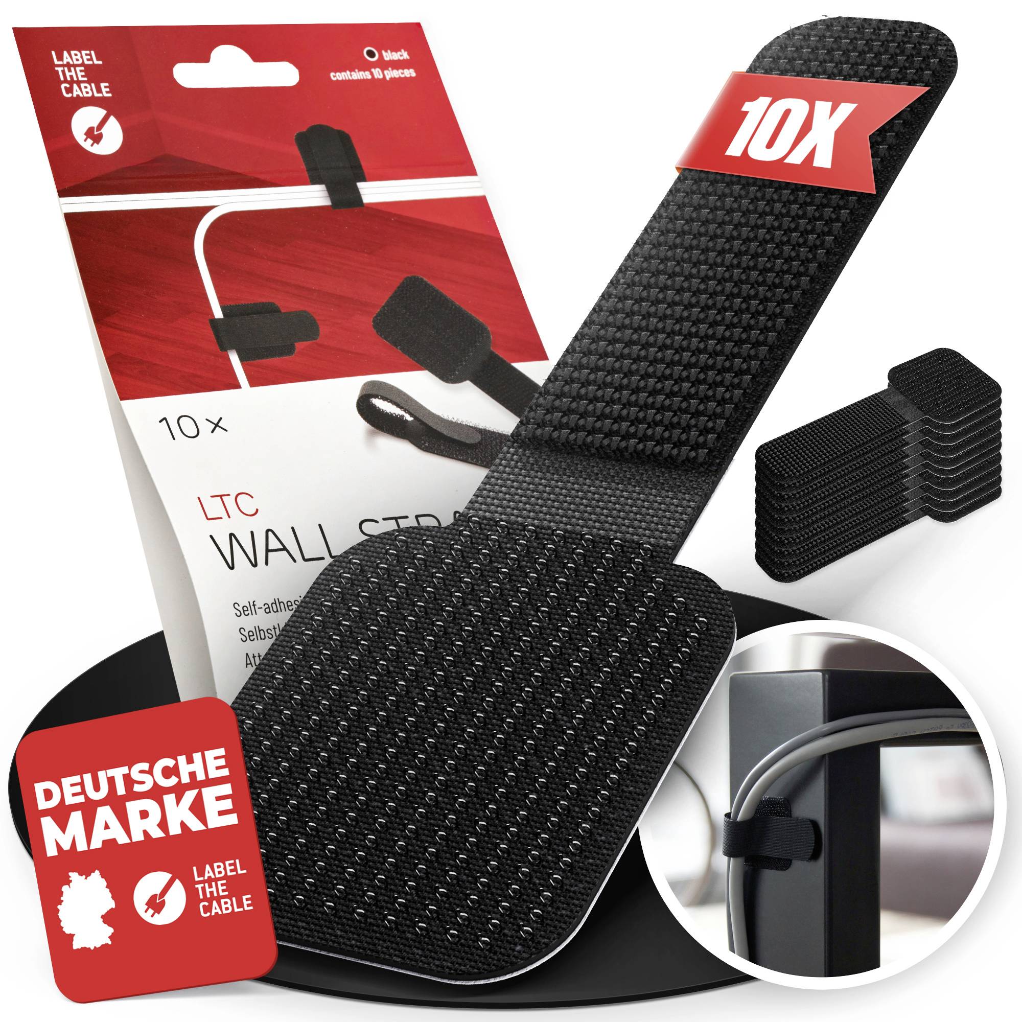 Product packaging for 'Label the Cable' 10x black self-adhesive cable straps, with close-up inset showing a strap securing cables to a monitor stand.