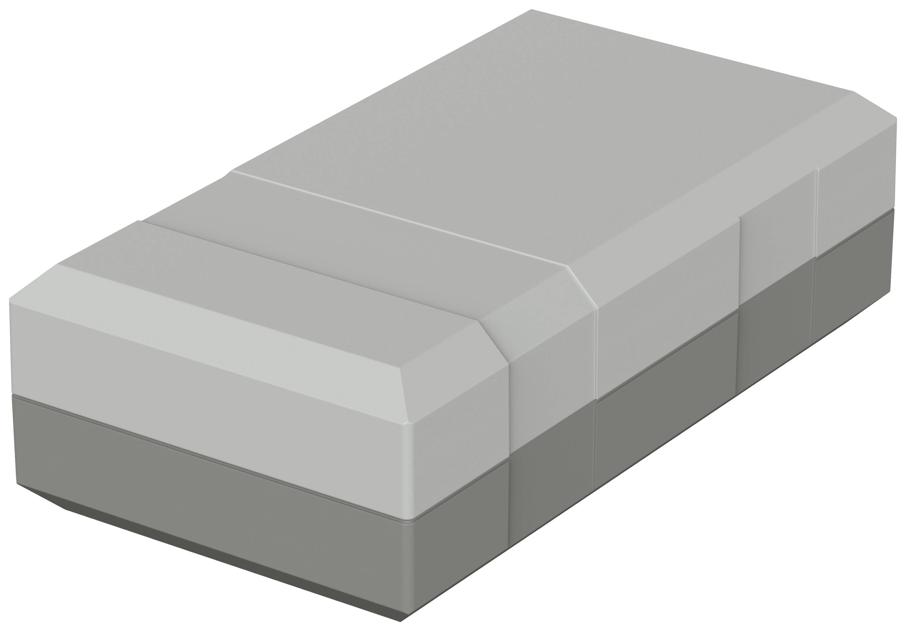 A grey, rectangular eraser is lying on a surface.