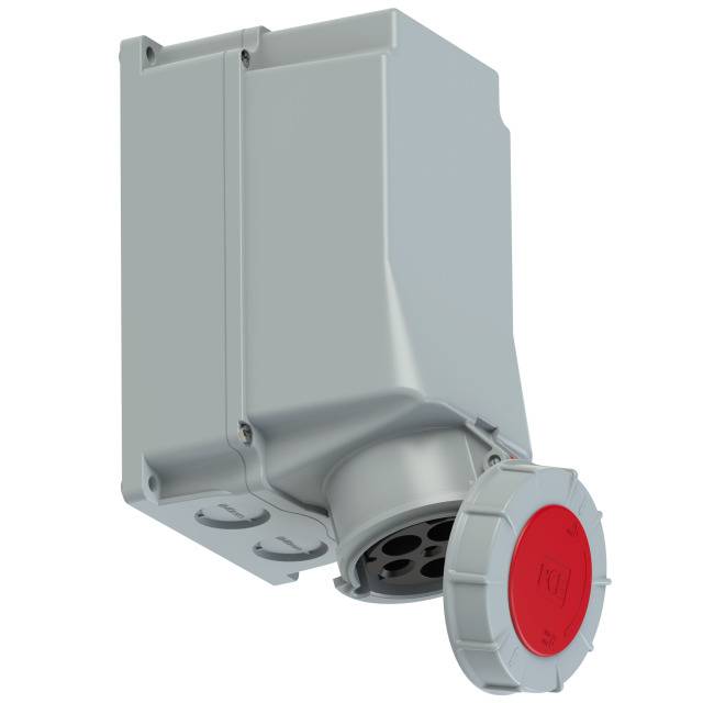 A grey, rectangular electrical junction box with a round, red plug at its base, in an industrial design.