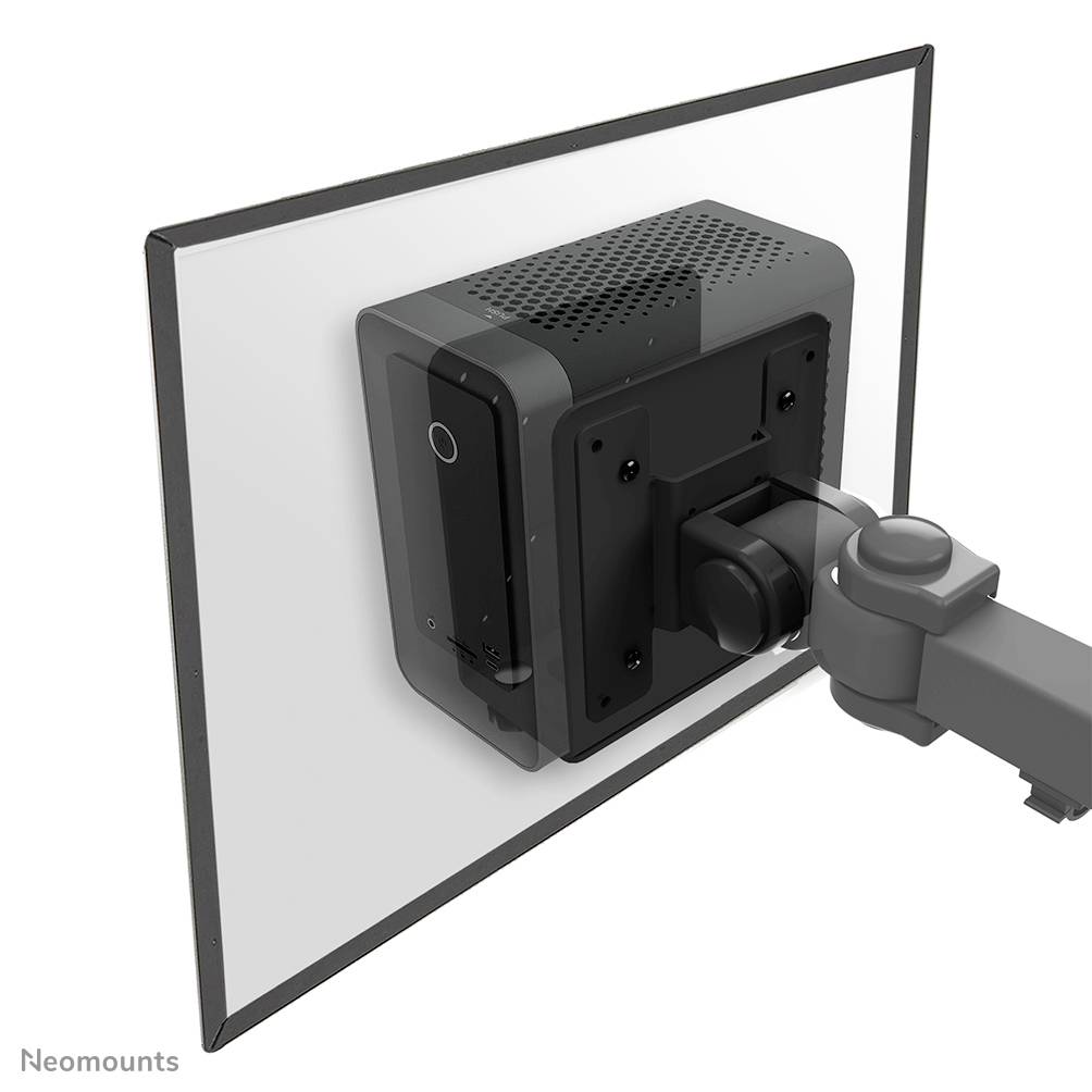 A monitor mounting system shows the back of a screen, attached to a movable arm, in an office or home workspace environment.