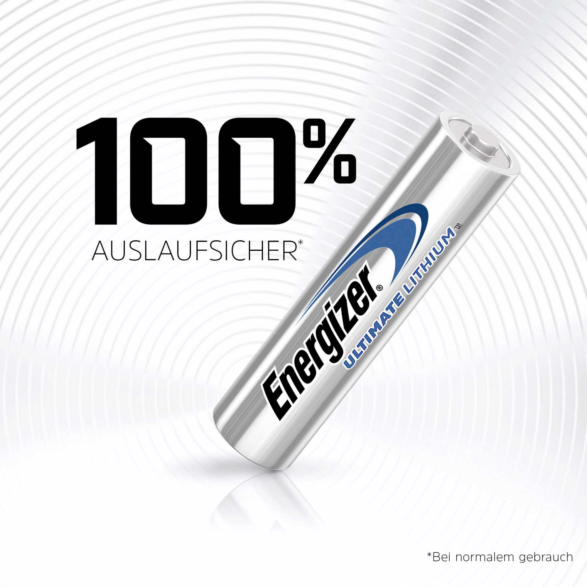 A silver battery with the inscription 'Energizer Ultimate Lithium' is lying at an angle on a white surface. Text: '100% leak-proof'.