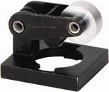 A black, rectangular metal element with two silver cylinders attached to a rotatable mounting.