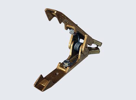 A metal clamp with a toothed grip, featuring a hinged design and a bolt for fastening, used for securing objects tightly.