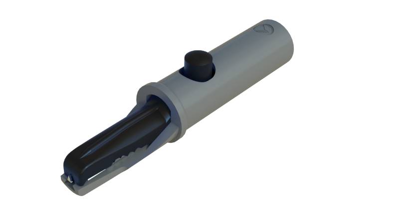 A silver, cylindrical tool with a black blade and push button, possibly a juicer or core remover.