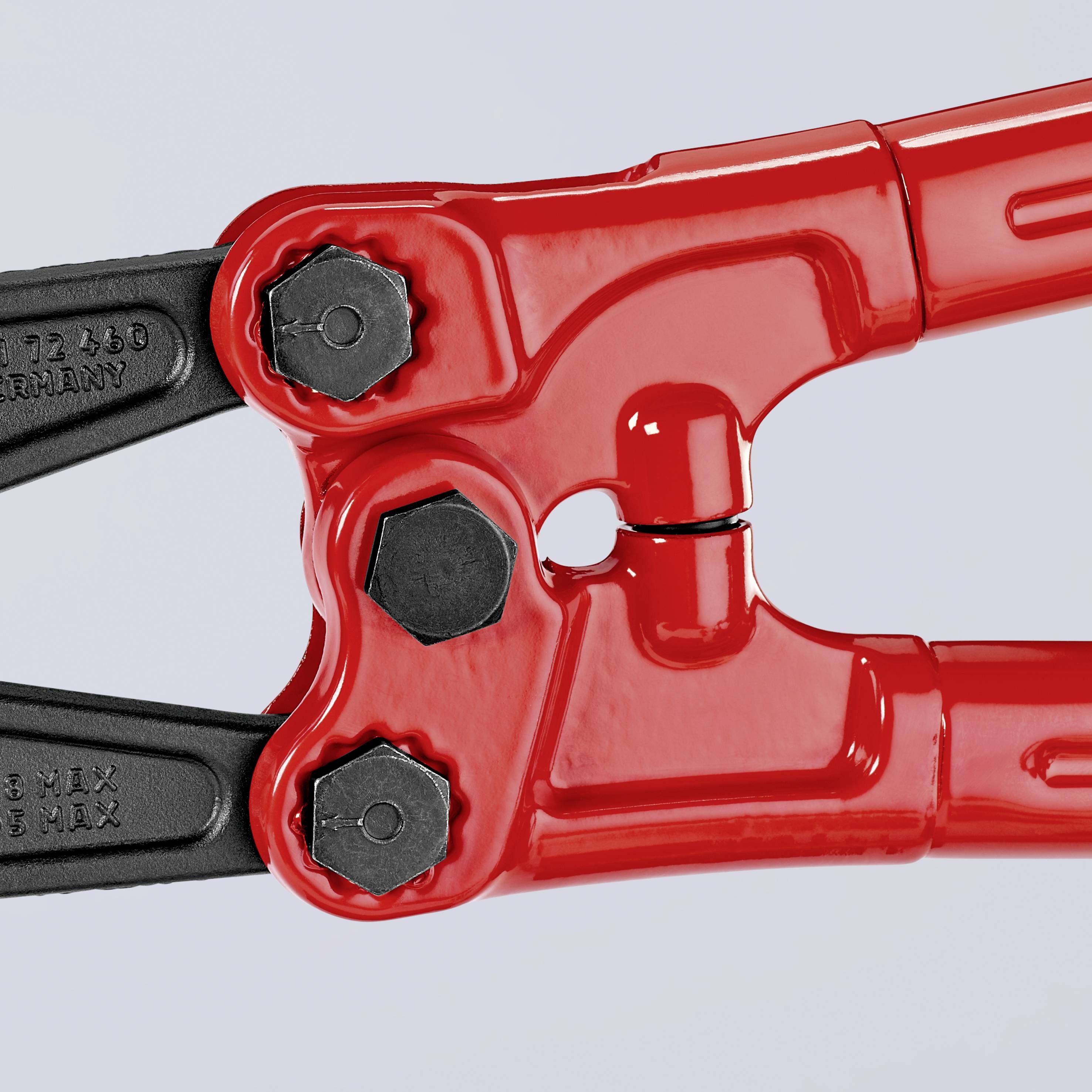 Close-up of a bolt cutter with a red handle and black cutting head.