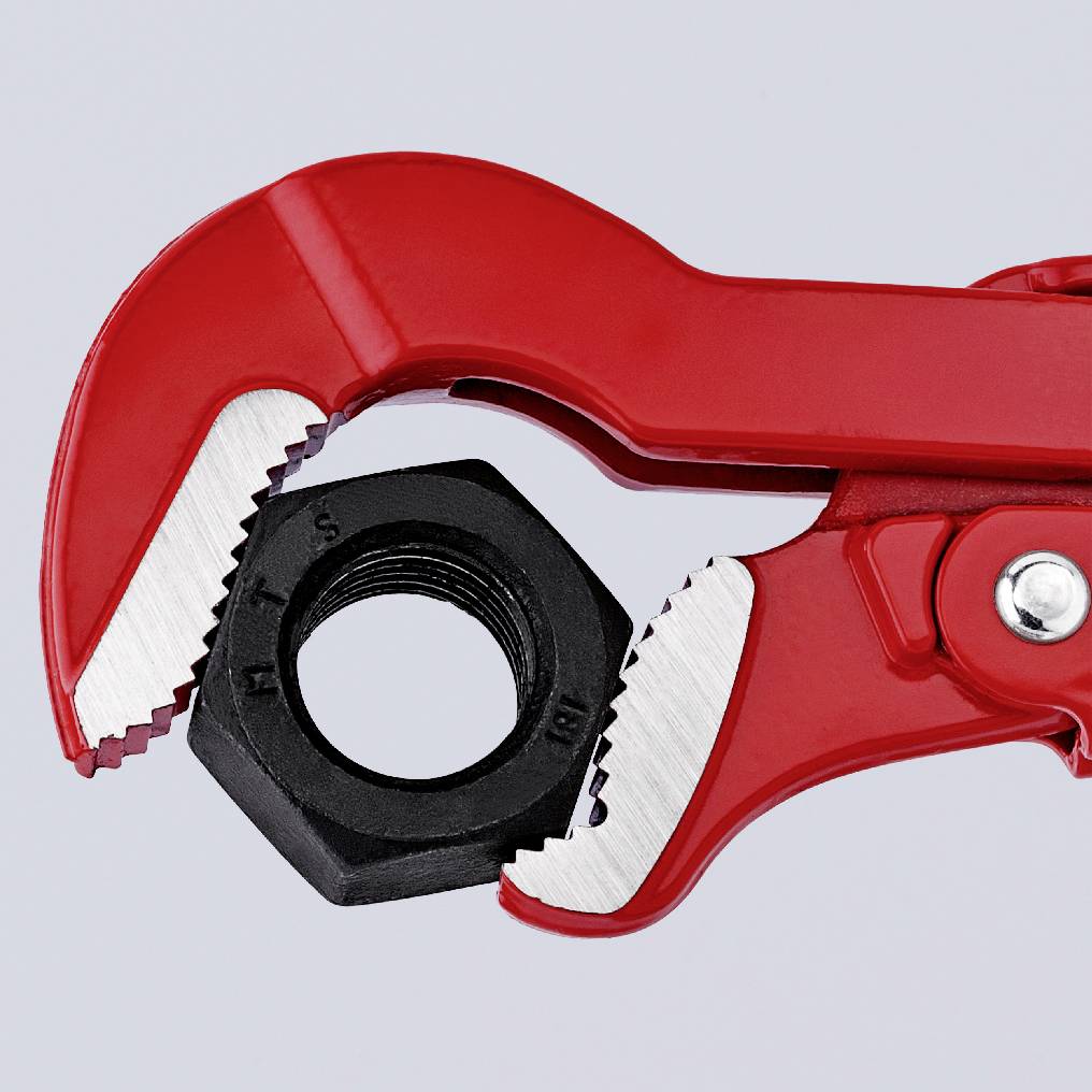 A red pipe wrench holds a black hexagonal nut, isolated on a grey background.