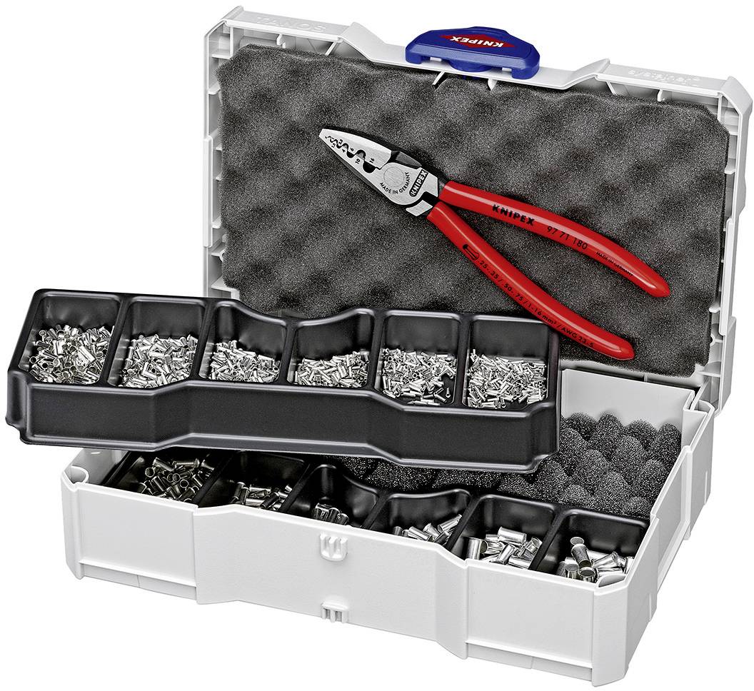 An open suitcase with various cable shoes in compartments and a red pair of pliers on top.