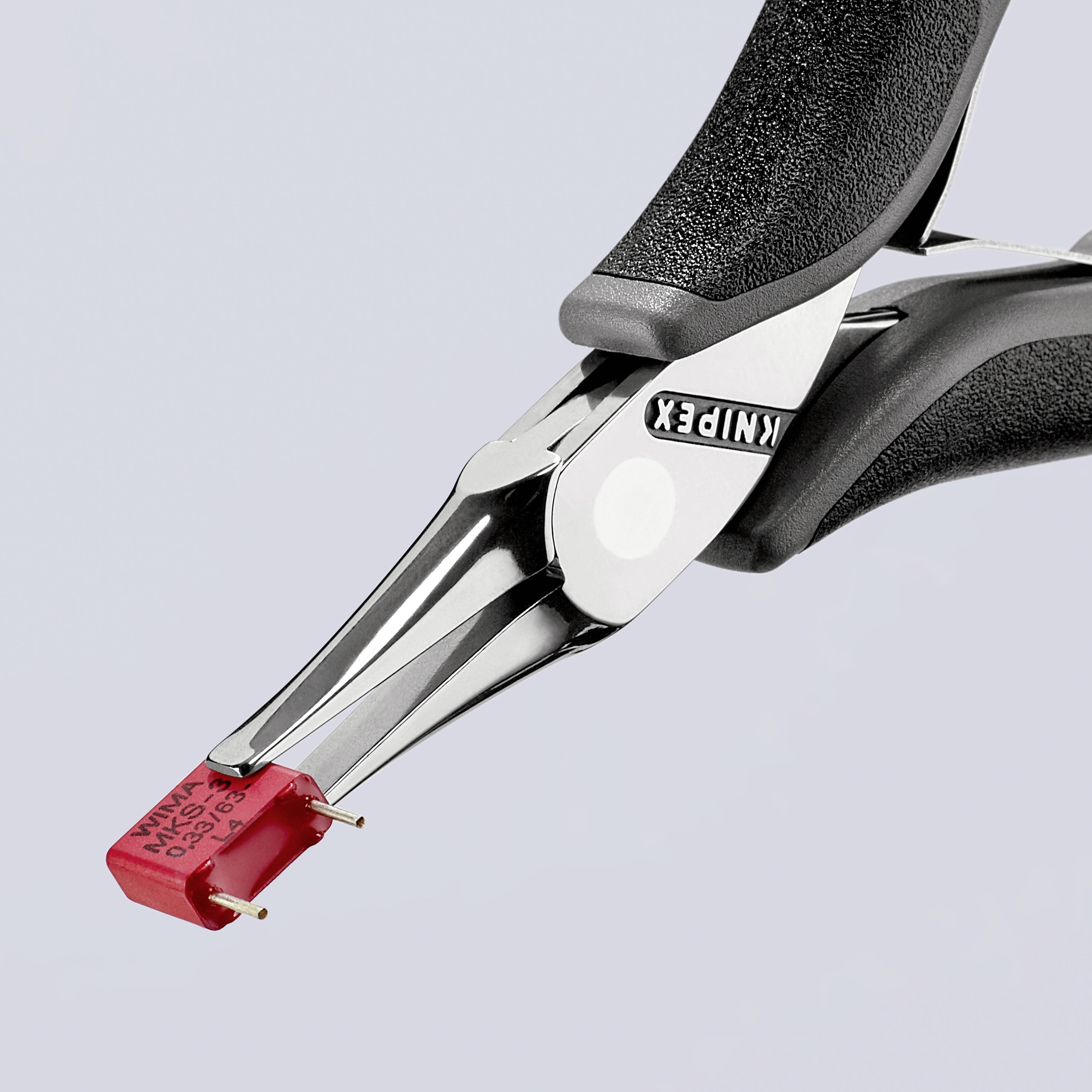 Wire cutters with a red cutting head and black handle, marked with 'Knipex'. They are used for cutting wires or cables.