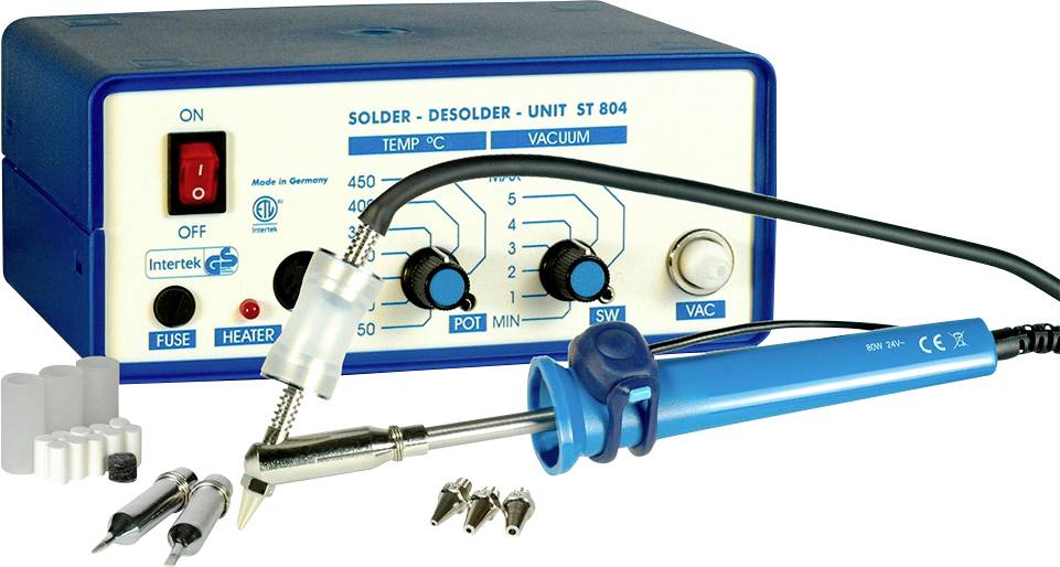 A soldering station with a blue soldering iron holder and silver tip. Front panel displays control knobs for temperature and vacuum.