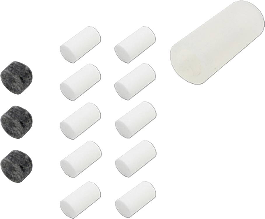 Several white cylindrical and black spherical objects are arranged in rows, possibly representing a collection of small components or pieces.