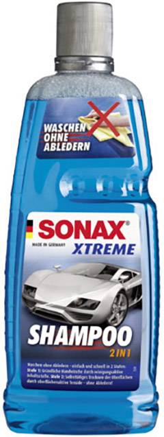 Bottle of 'Sonax Xtreme Shampoo 2 in 1', with a car image on the label. Note: 'Wash without leaving residue'.