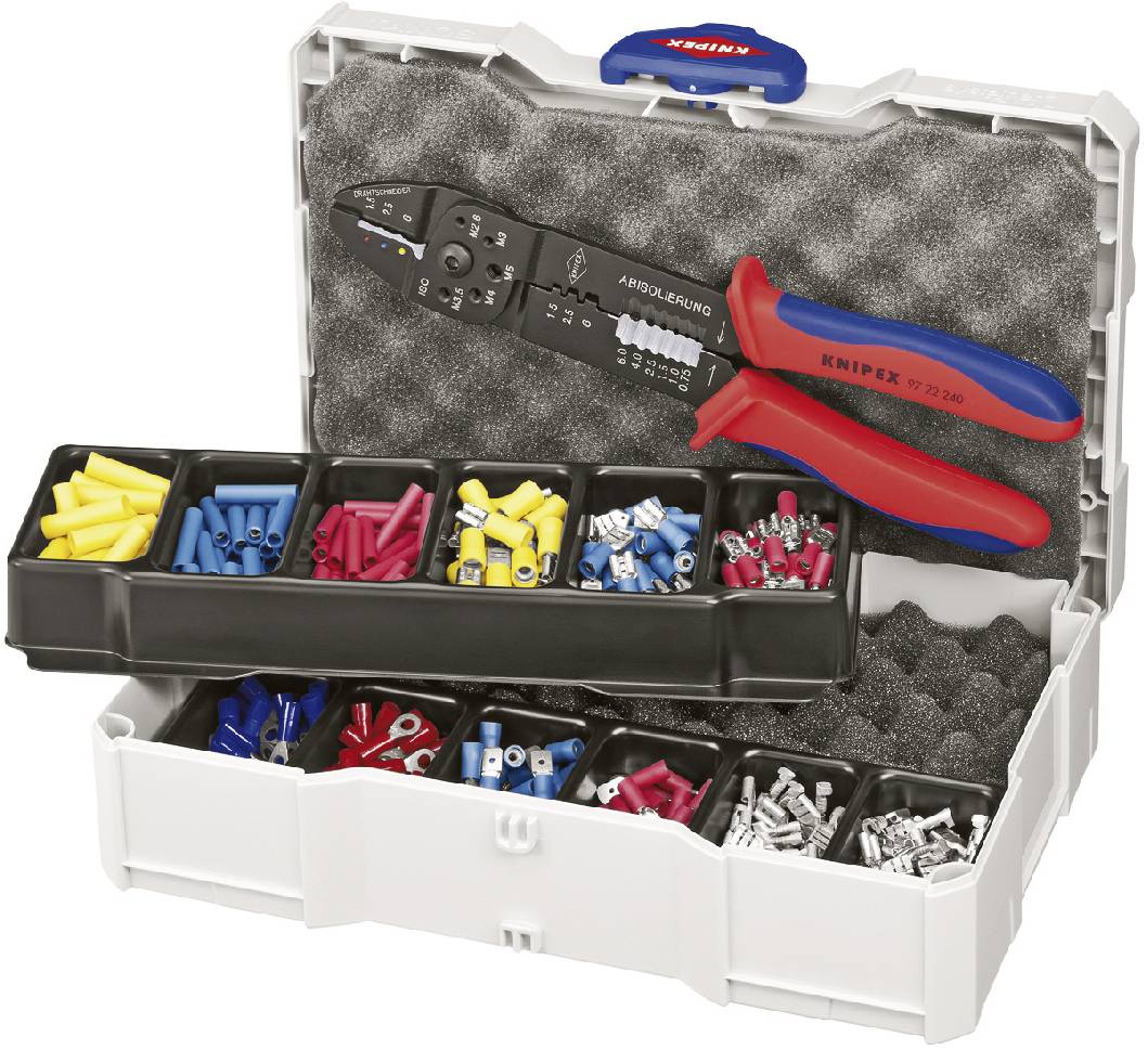 An open toolbox with various cable lugs in compartments and a crimping tool for electrical installations.