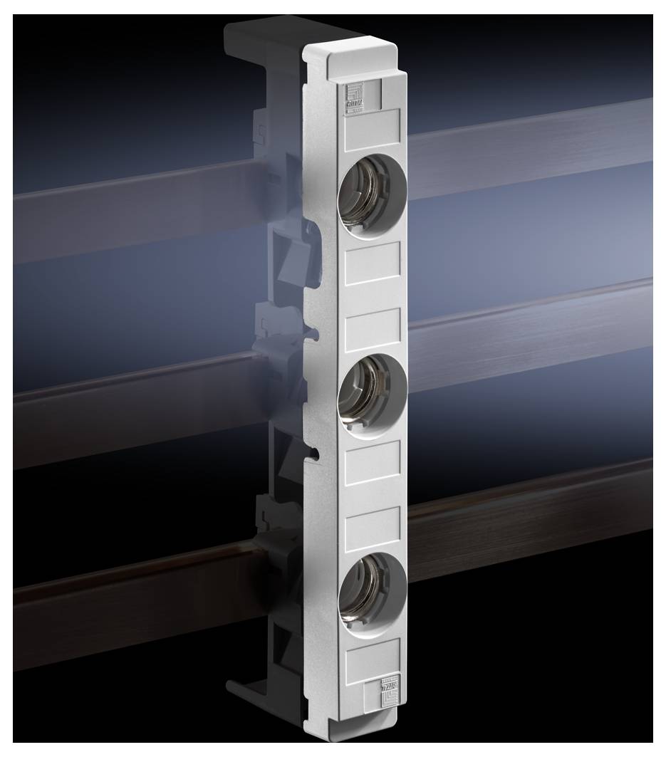 'Mid-section DIN rail component', with three circular openings, mounted in a vertical, grey frame against a dark background.