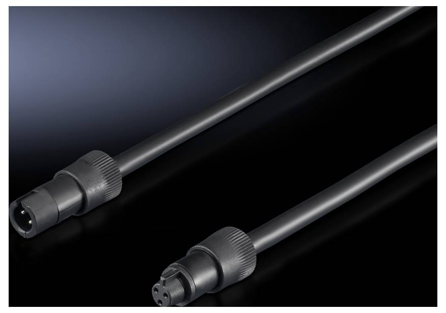 Two black cables with round plugs at each end lie on a dark background.