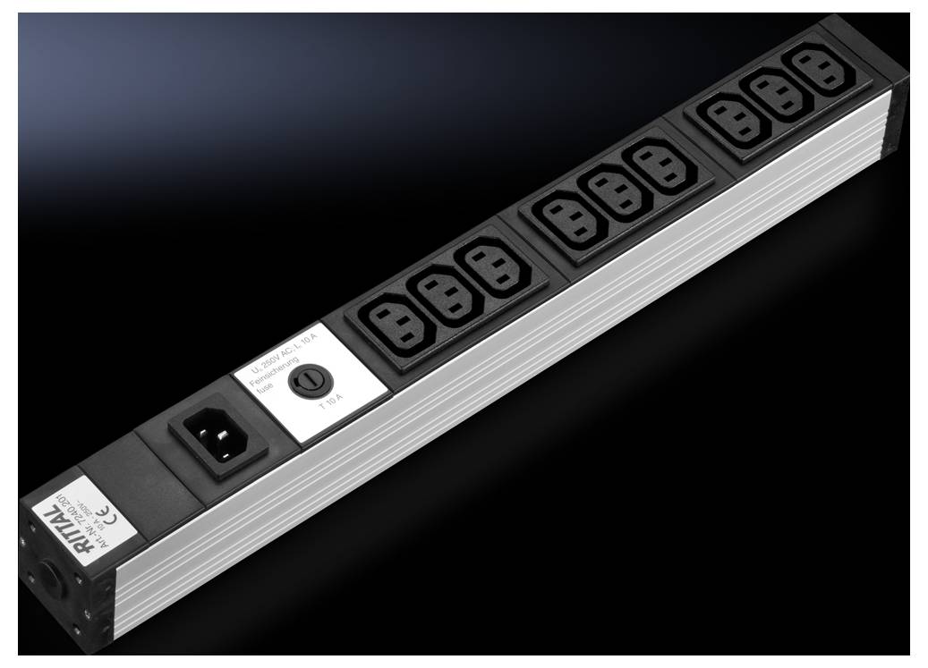 A black eight-socket power strip with a switch located in the centre, positioned against a dark background.