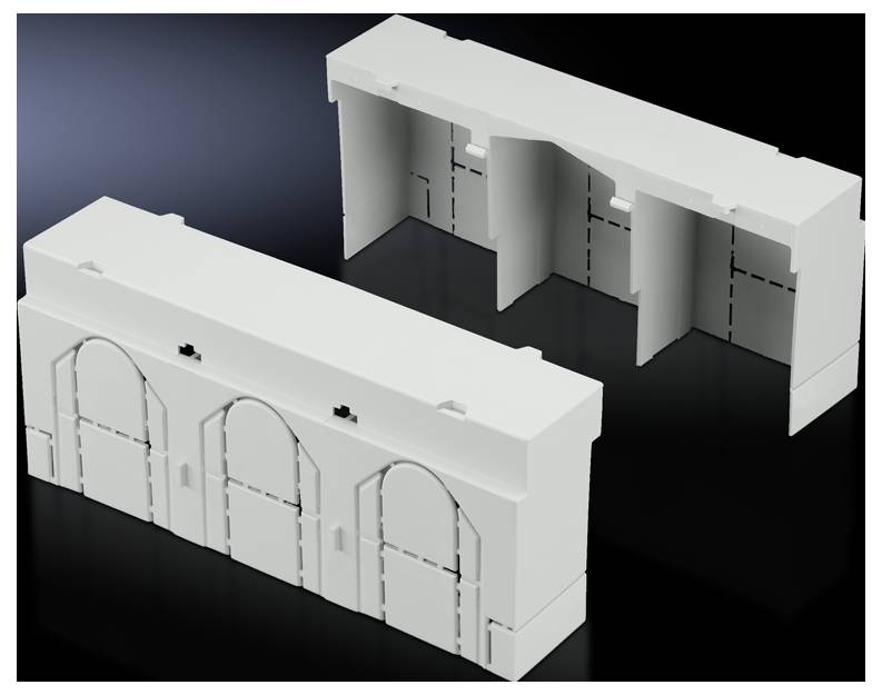 Two white plastic parts with rectangular openings and symmetrical structures, lying on a black background.