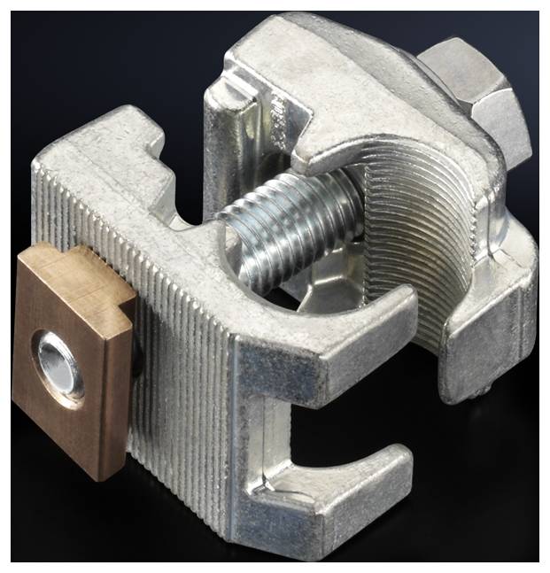 Metal clamp with threaded screw and copper plate, against a black background. Used for connecting and securing materials.