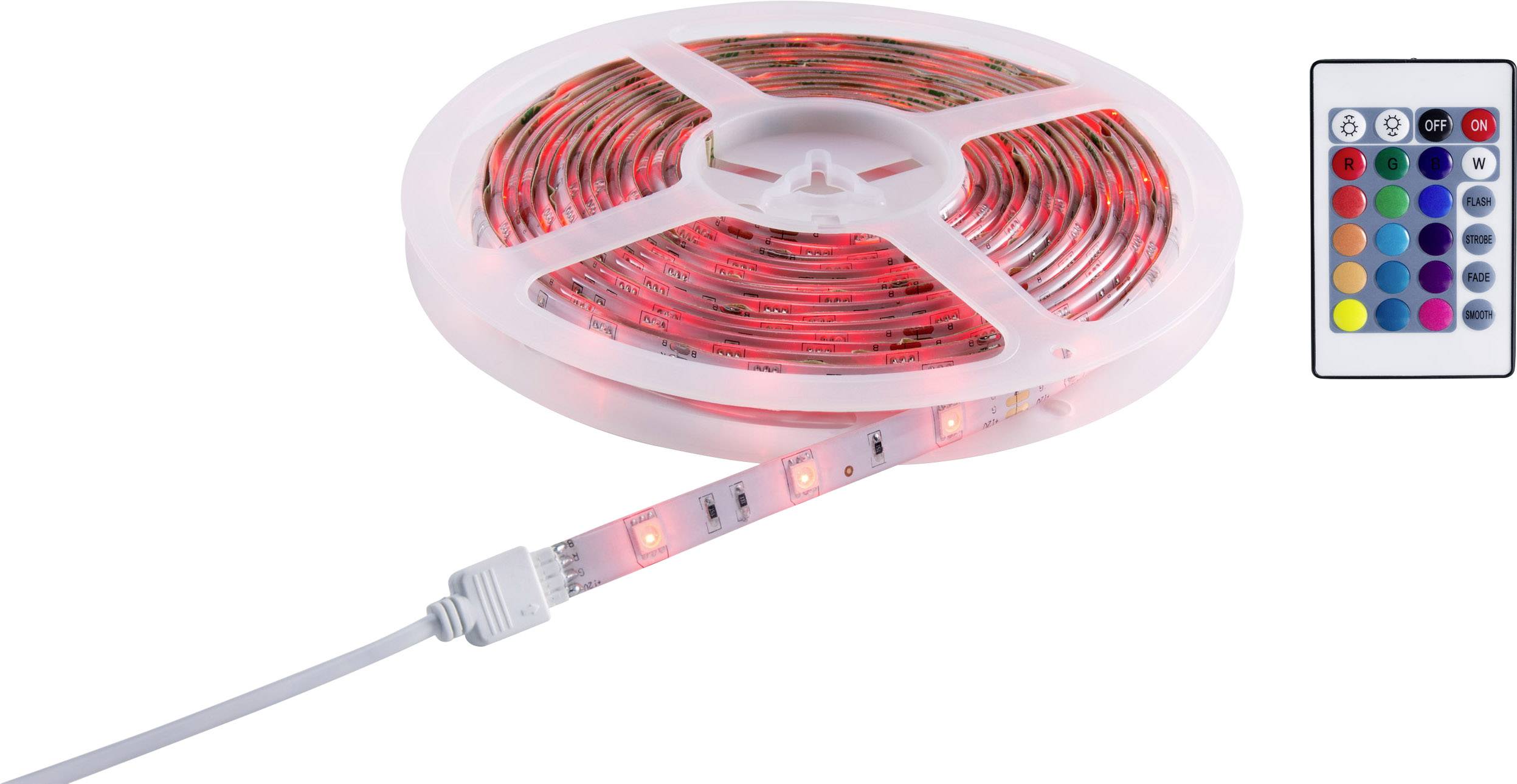 Role of a luminous LED strip with red light, alongside a remote control with various colour combinations.