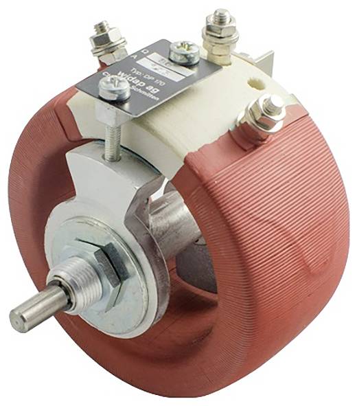 Close-up of a red laminated electrical transformer/coil with metal shaft and terminal bolts on a white background.