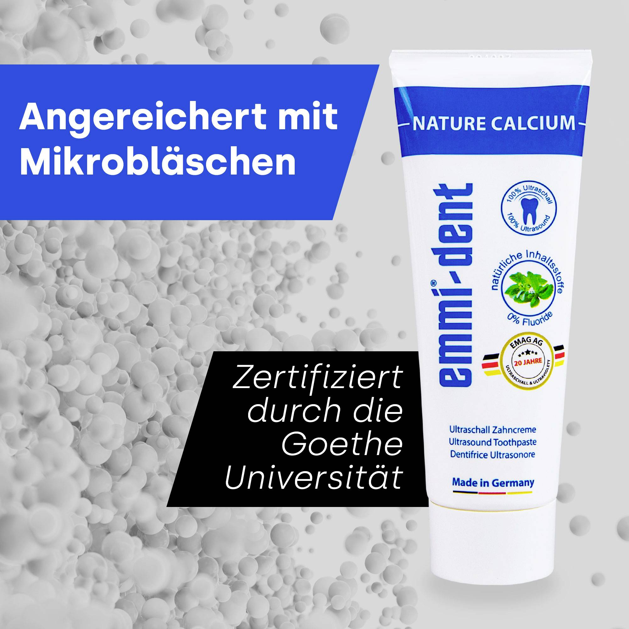 Toothpaste tube with blue label, inscription 'Enriched with microbubbles', certificate from Goethe University, brand 'emmi-dent'.