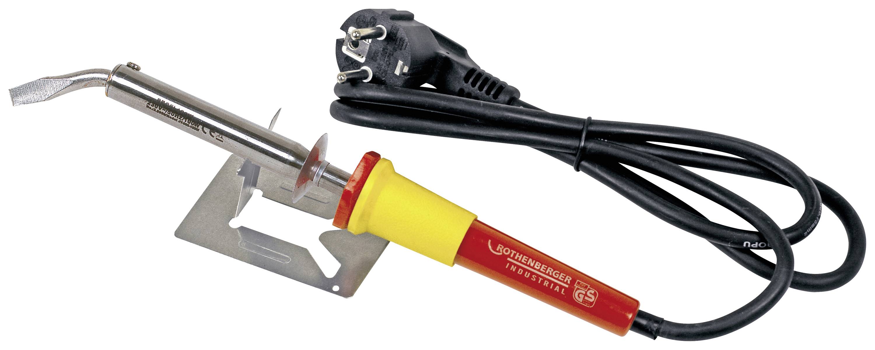 A soldering iron with a yellow and red handle is resting on a metal stand. A black power cable with a plug is attached.