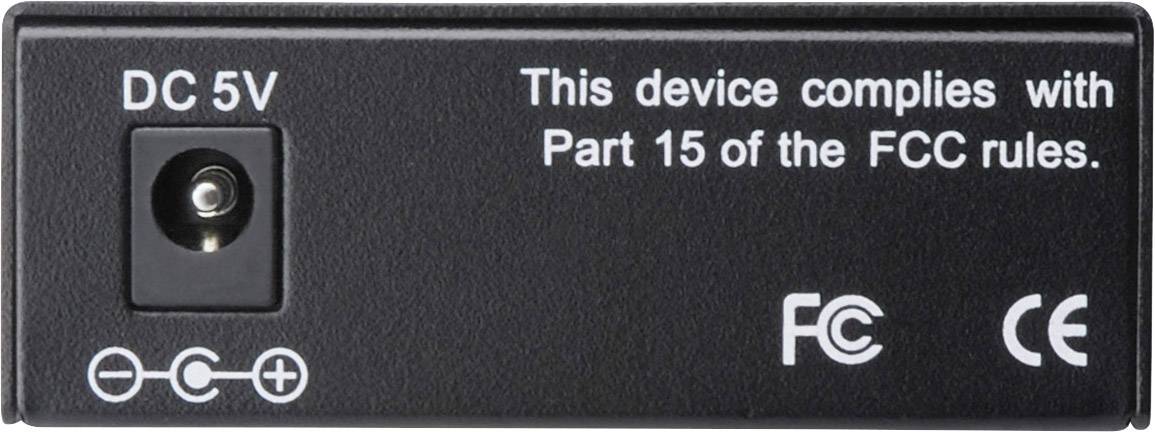 Rückseite eines elektronischen Geräts mit einem Gleichstromanschluss und Text: 'Dieses Gerät entspricht Teil 15 der FCC-Vorschriften'.