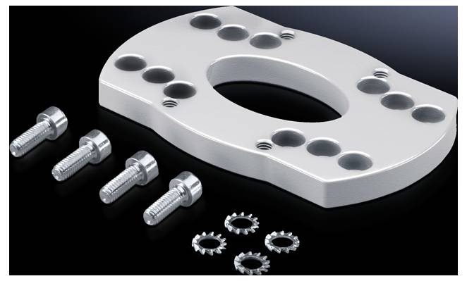 Metal plate with several holes beside four screws and four washers on a black background. Engineering components.