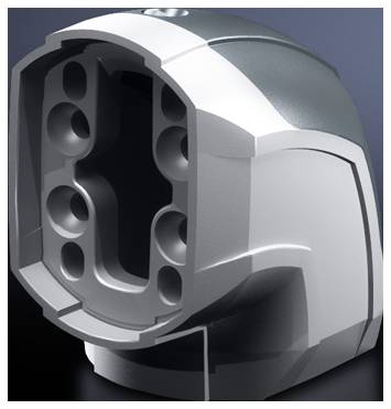 Close-up of a silver electric vehicle charging socket with multiple round plug openings.