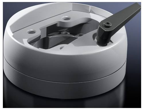 Grey, round mechanical component with a black lever on top, positioned on a glossy surface.