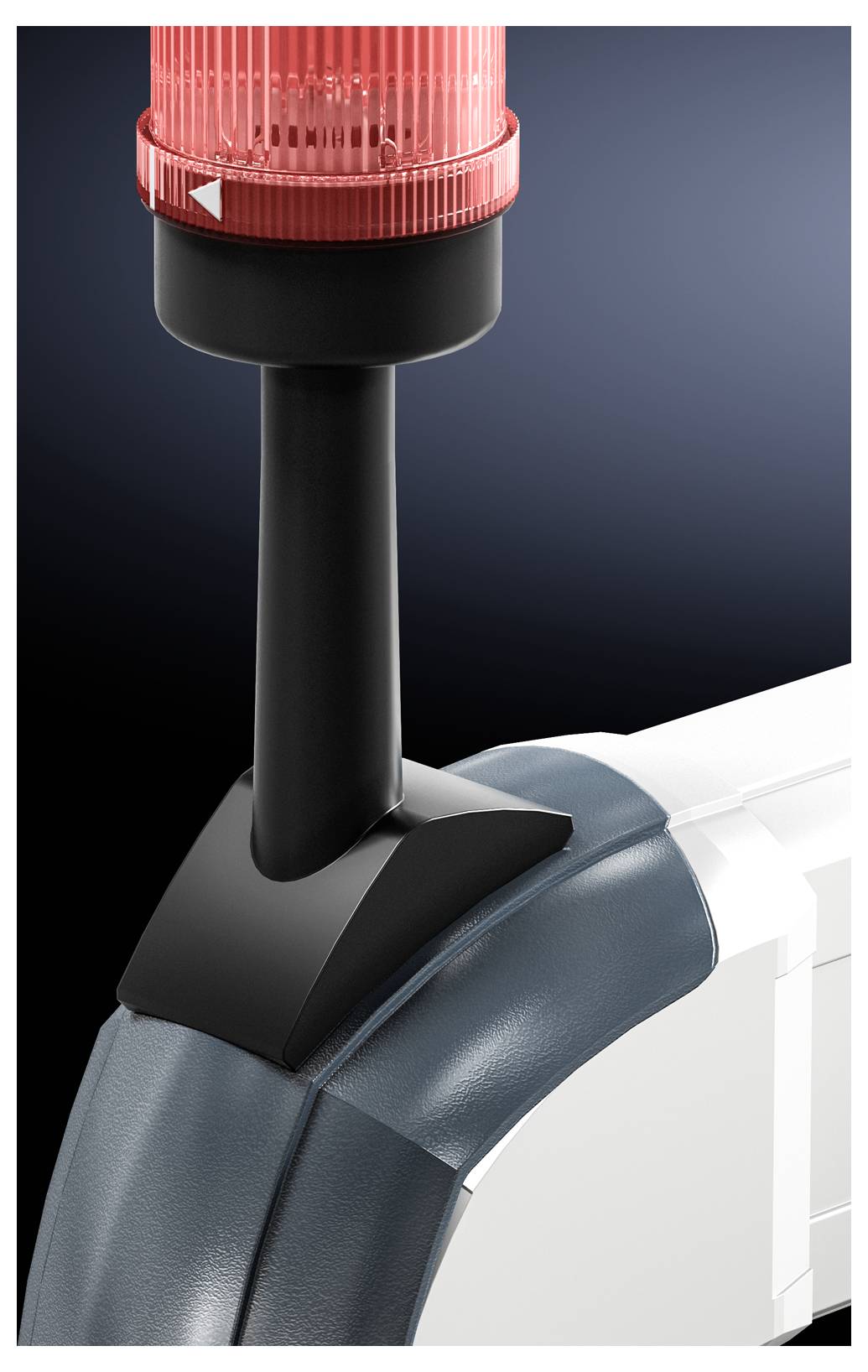 Red warning light mounted on a black base, installed on a machine. Signalling danger or attention required.