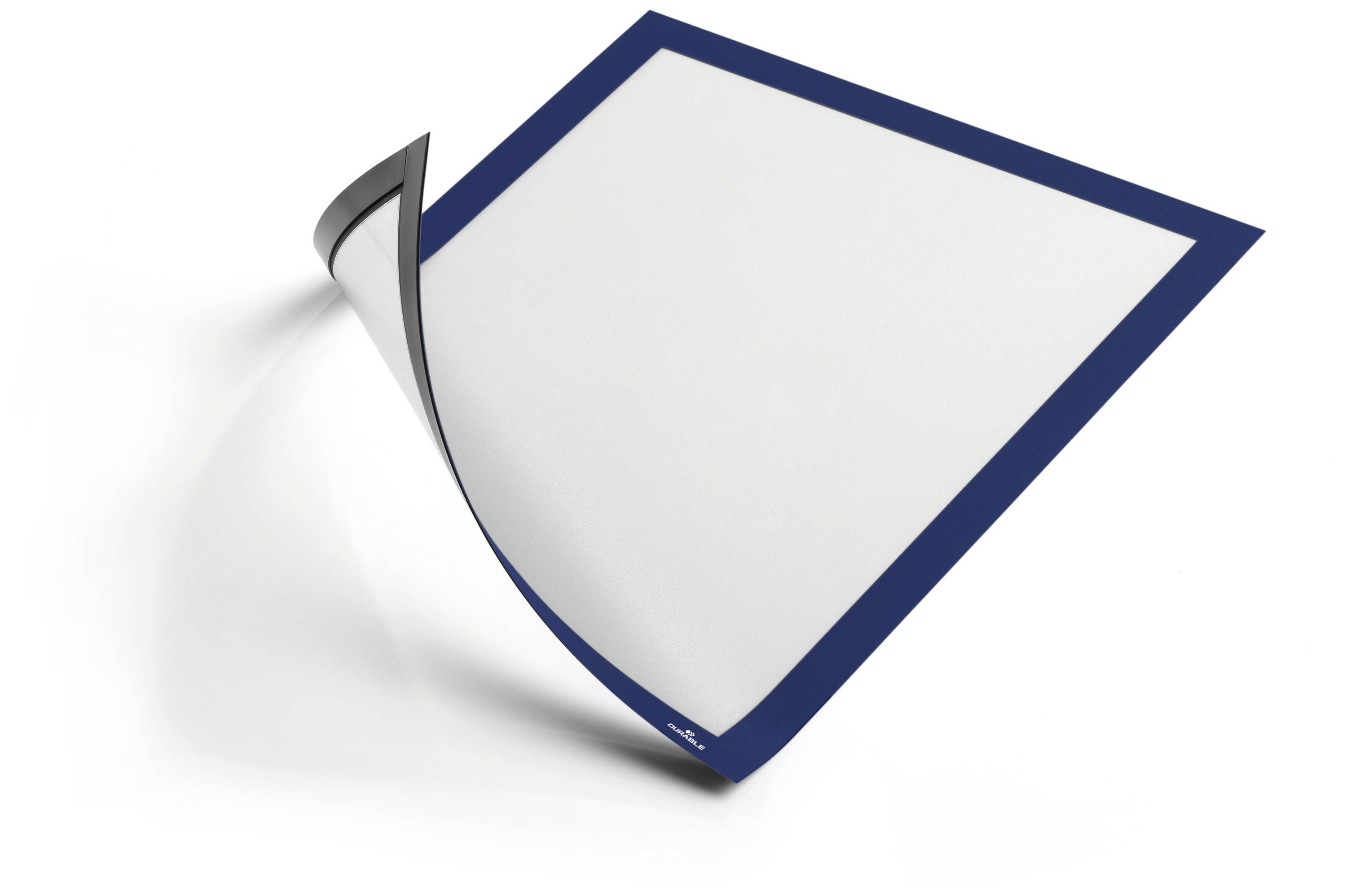 A sheet of paper with a dark blue border is folded up at one corner, revealing its white underside.