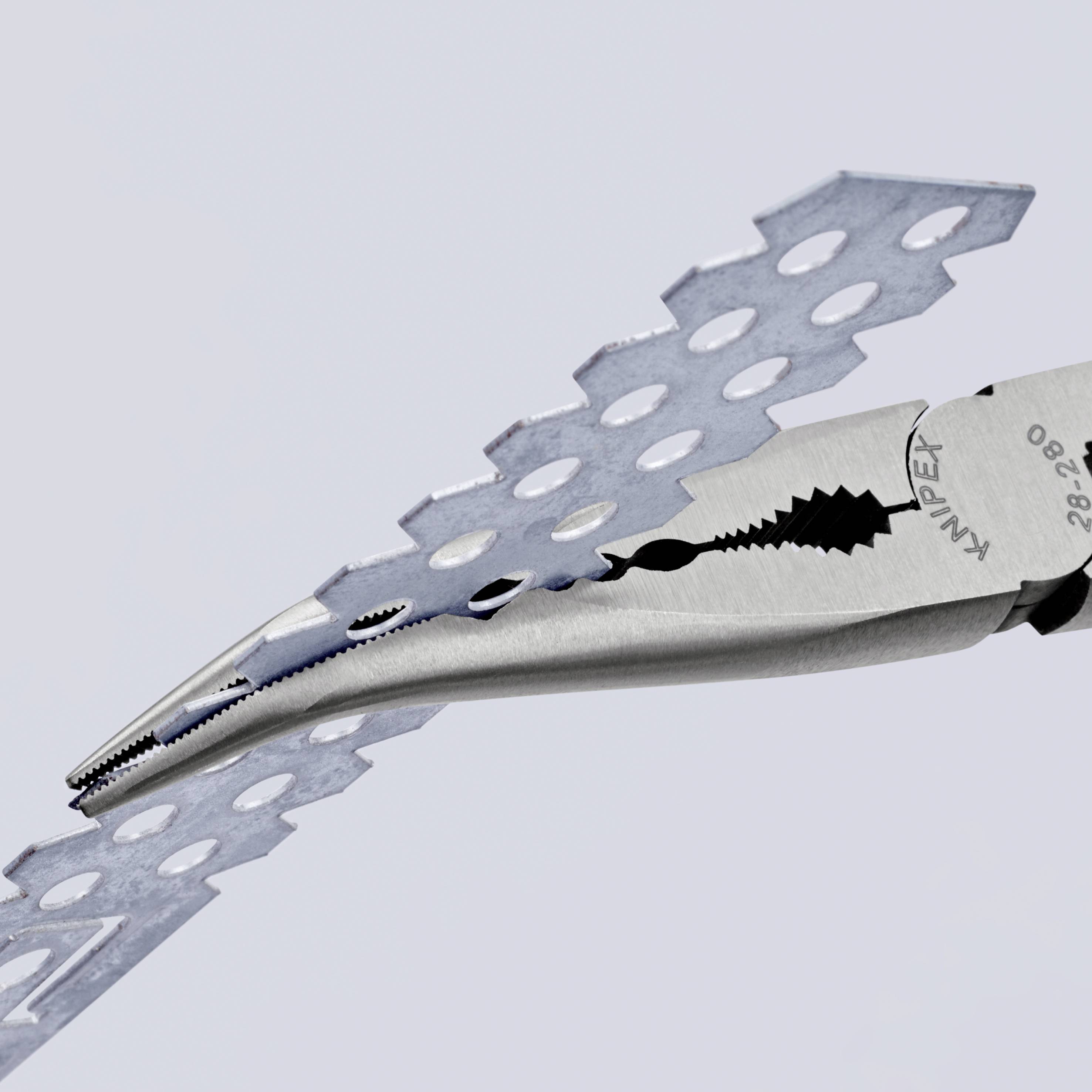 A grey multi-tool with a curved, serrated blade, surrounded by perforated metal discs, hovers against a grey background.