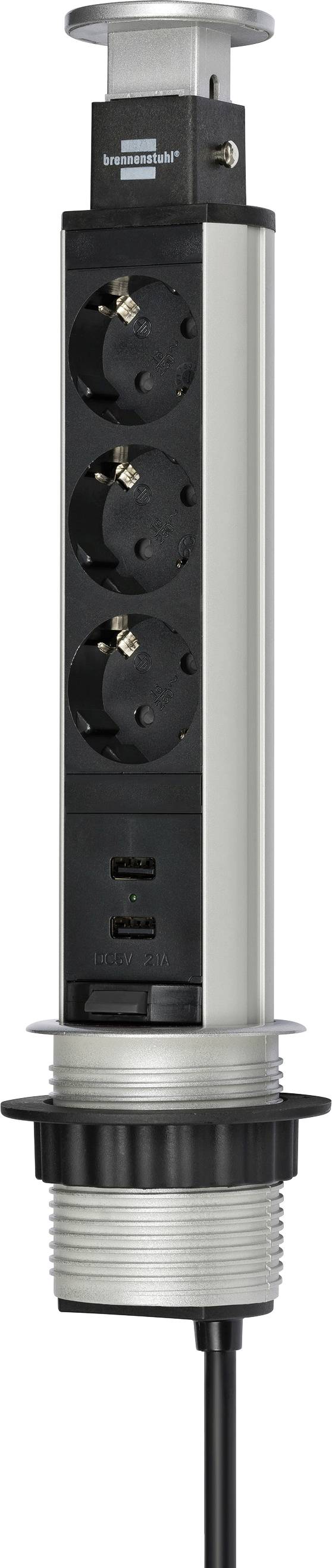 Black cylindrical pop-up power outlet with three AC sockets and two USB ports, mounted in a silver countertop housing with a power cord.