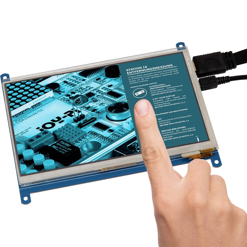 A person touches the screen of a blue portable electronic device with technical information displayed on the screen.