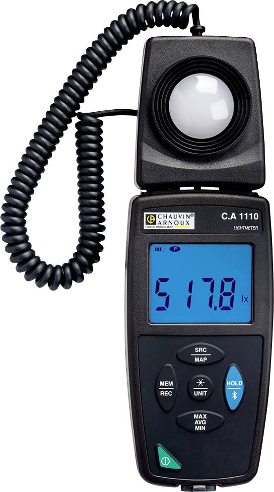 A digital light metre, Model C.A 1110, displays a measurement of 517.8 lux on the screen. The light sensor is positioned at the top.