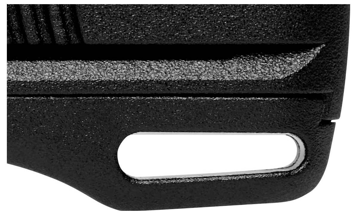 Black, structured plastic component with an oval hole. Part of a tool or device, detailed close-up, function unknown.