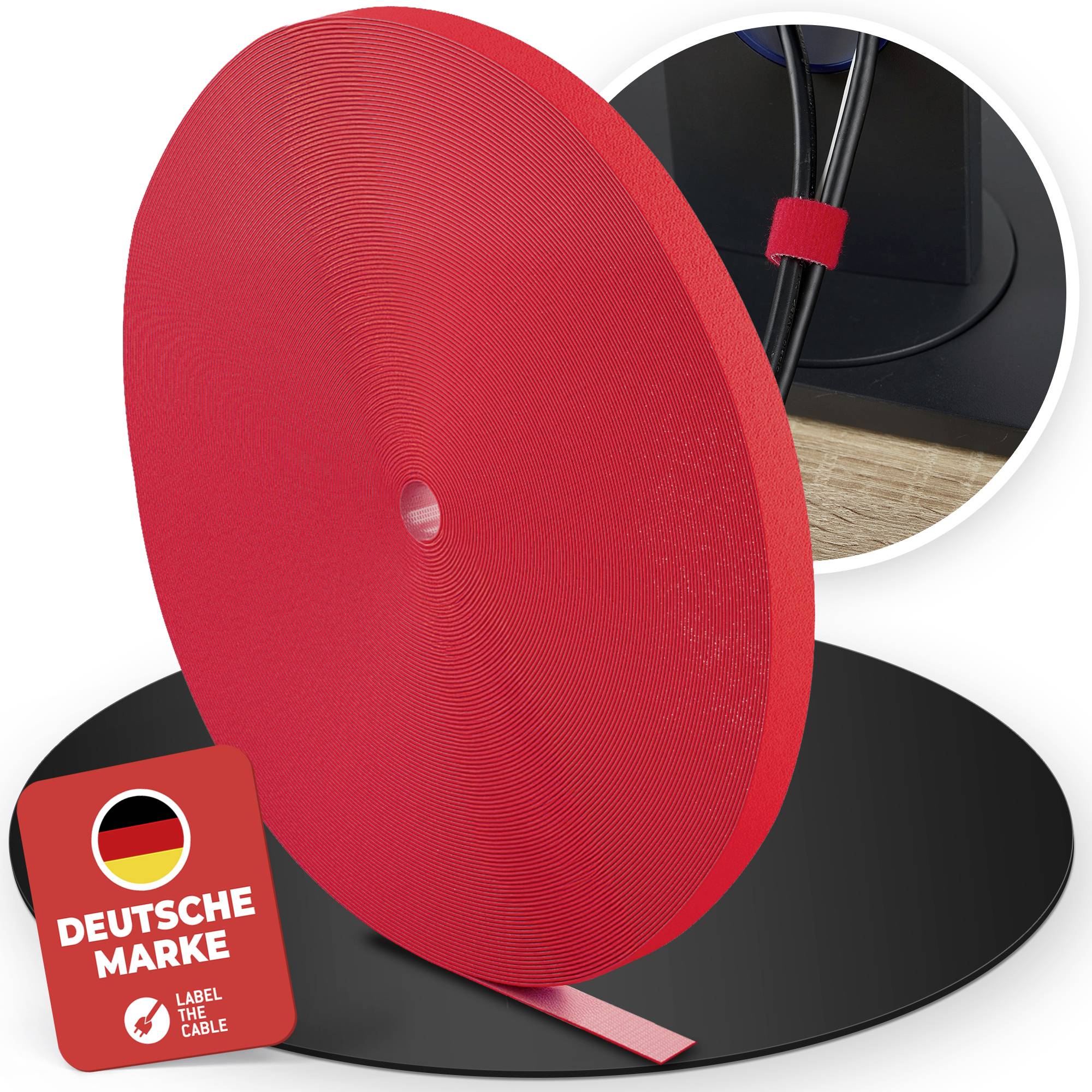 Large red cable-management spool with German 'Deutsche Marke' label, showing a cable secured by a red strap in a small inset photo.