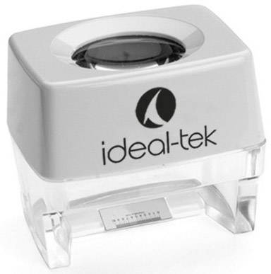 A rectangular stamp with the inscription 'ideal-tek' on it. The stamp has a transparent base and a grey handle.